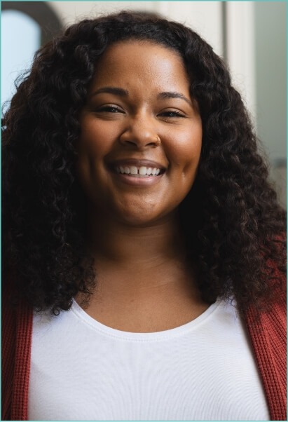 portrait-of-happy-african-american-woman-with-curl-2023-11-27-04-50-22-utc (1)